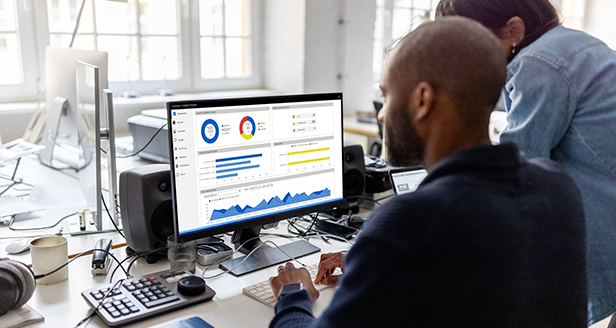 two people looking at PaperStream dashboard